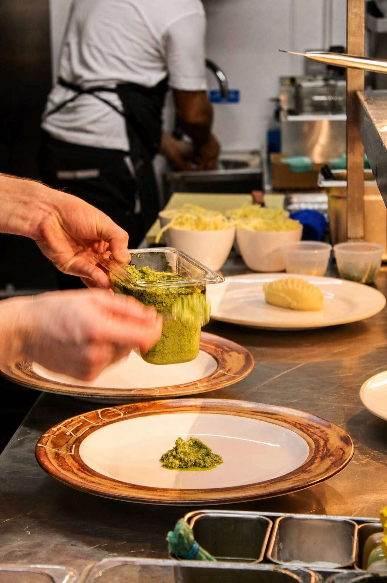 A dish being plated in the Latimers kitchen
