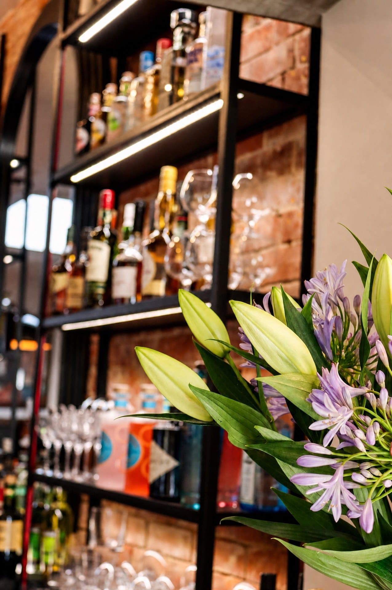 The back bar at Latimers with fresh flowers